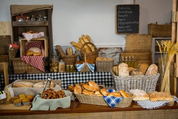 Various bread and cookies on counter