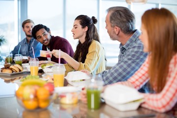 Creative business team having meal