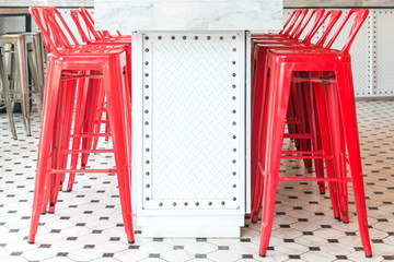 Modern metal red chair with marble table counter