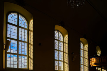 Beautiful highwindows in old church, view from the inside