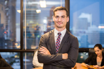 Businessman stading with team while meeting, Businessman leader concept, 20-30 year old.