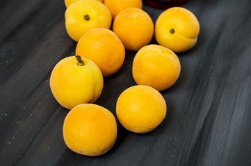 Perfect ripe apricot fruit pictures in plate.Herbal solution to constipation disease apricot fruit
