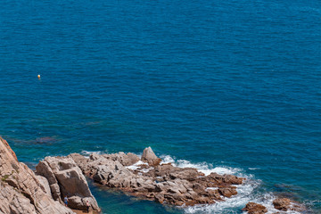 The Summer Blue sea with the rock