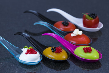 Molecular cuisine dishes in plastic buffet tableware 