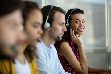 Customer service executive working at office
