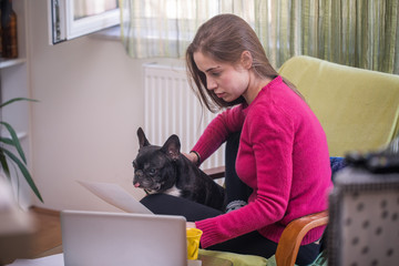 Woman and dog at home 