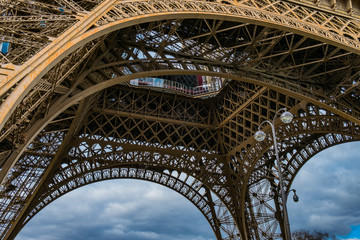 Fototapeta na wymiar Underneath the Eiffel Tower