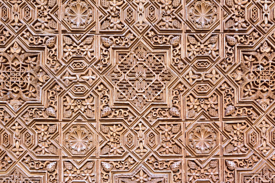 Background  of arabic decoration in plaster. Alhambra of Granada.