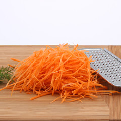 Fresh vegetables on the shredder