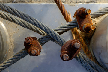 Old ruged metal rope crossed