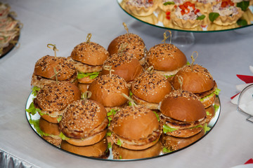 Design of a buffet table. Snacks.Sandwiches