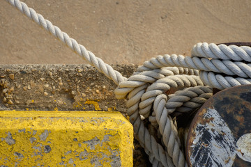 Boat rope on a concrete background