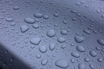Water drops on top of metal surface