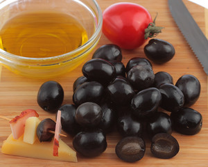 Fresh olives on the shredder