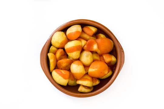 Patatas bravas in bowl isolated on white background
