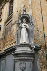 Fototapeta na wymiar Saint statue, Valletta streets, Malta