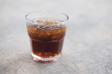 Glass of cola with ice for Cool off in the summer