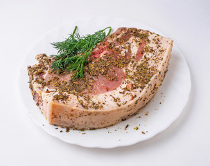 Meat with lard spicy on plate. Isolated