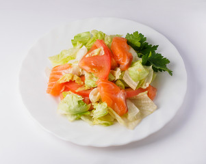 Salad with salmon fish. Isolated