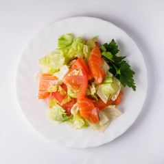 Salad with salmon fish. Isolated