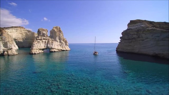 Sailing yacht at the pirates bay (Kleftiko) on the Island of Milos, Cyclades, Greece