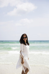 Fototapeta na wymiar Young Vietnamese woman on the beach