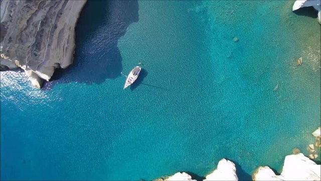 Sailing yacht at the pirates bay (Kleftiko) on the Island of Milos, Cyclades, Greece