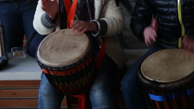 Amateur musicians give a street concert on the drums