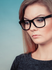 Closeup of woman thinking face expression