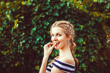 Fototapeta premium Woman in the summer garden
