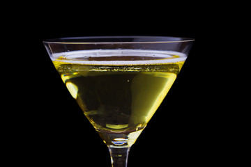 white wine glasses on wooden table.