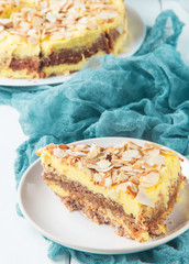 Almond cake with caramel, selective focus, vertical