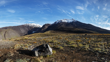 Panorama - volcanic landscape of Kamchatka Peninsula: autumn view of Kozelsky Volcano on sunny day....