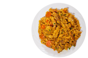 meat with rice and vegetables. top view. isolated on white