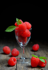 Raspberries in small glass