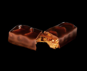 chocolate bar with caramel  on a black background