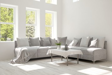 White room with sofa and green landscape in window. Scandinavian interior design. 3D illustration