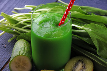 Healthy green smoothie and ingredients - superfoods, detox, diet, health, vegetarian food concept