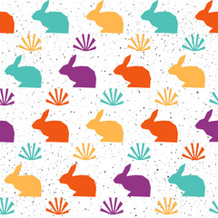 Rabbit seamless pattern background. Abstract purple, yellow, green, orange colored rabbit