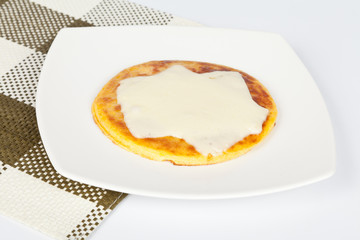 Corn arepa with mozzarella cheese