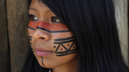 Closeup face of Native Brazilian Woman at an indigenous tribe in the Amazon