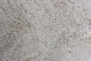 Surface of low quality concrete with foreign inclusions