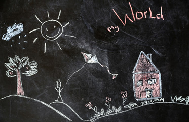 chalk drawing of house and sun on a black background,