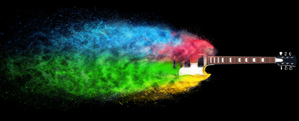 Hard rock guitar disintegrating into colorful particles