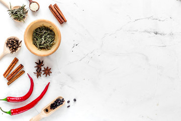 Dry colorful spices, chili pepper on kitchen stone table background top view mockup