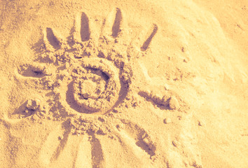 sun, sand, warm, abstract background. Summer, the sun drawn in the sand..