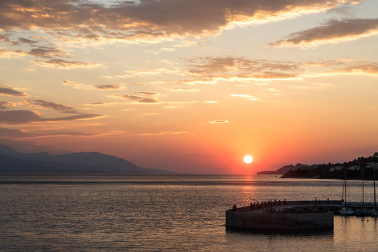 Beautiful sunset with sea and pier, Loutraki, Grecee