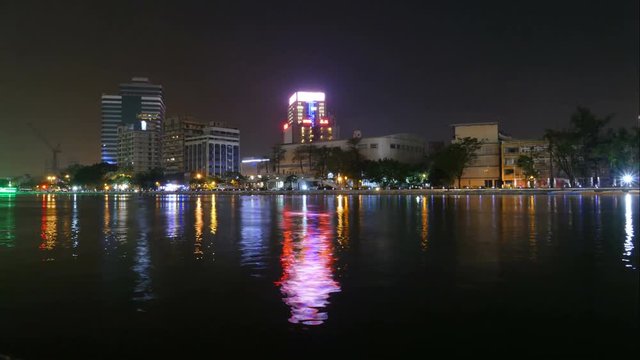 Skyline of Kaohsiung at love river at night, time lapse