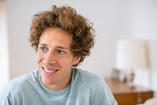 Portrait of young man smiling happily