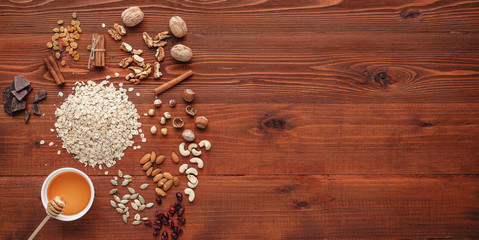 Ingredients for delicious and healthy eko granola - obrazy, fototapety, plakaty